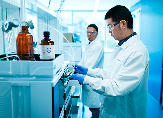 Downstream development engineers optimize a chromatography process. Downstream development engineers optimize a chromatography process.