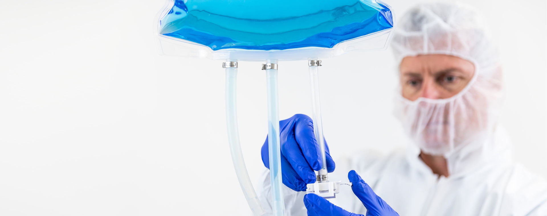 A bioprocess bag being connected to a tubing assembly A bioprocess bag being connected to a tubing assembly